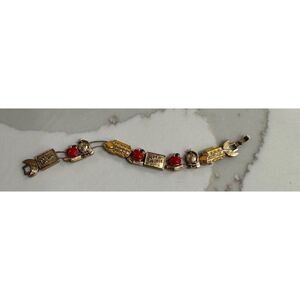 VINTAGE TOFA gold toned teacher gold charm bracelet!